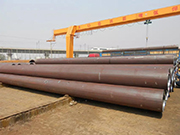 Derusting method and production process of large diameter straight seam steel pipe